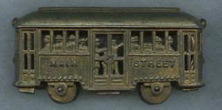 18 - 1900s CAST IRON “MAIN STREET” TROLLEY BANK - ORIG GOLD PAINT,  PEOPLE ON BOARD 2
