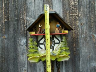 VINTAGE GERMAN CHALET MUSICAL CUCKOO CLOCK WITH WOOD CHOPPERS ANIMATED 8