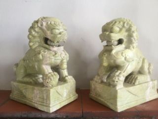 A Large Handcarved Antique Green Chinese Soapstone Foo Dogs