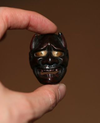 antique Japanese rare carved lacquer Netsuke Demon mask,  signed Deme,  EDO PERIOD 2