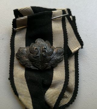 German WW 1 Iron Cross 2.  Class with orig.  Ribbon and Oak Leave Clasp 2