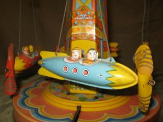 Vintage J Chein Co RIDE A ROCKET Tin Windup Toy Mechanical Carnival Circus Ride 7