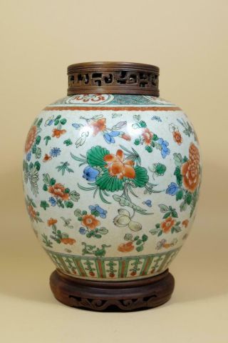 A Chinese Famille Rose Lamp Jar.  With Wood Cover And Base.