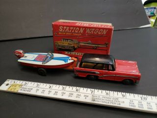 Vintage tin toy station wagon with boat friction Japan 5