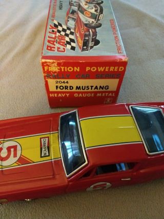Tin Ford Mustang,  by Bandai,  in near. 6
