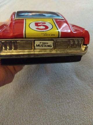 Tin Ford Mustang,  by Bandai,  in near. 9