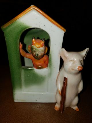 Vintage Porcelain Pig And Devil Holder?