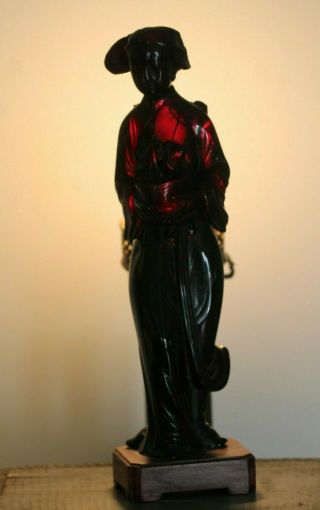 Antique c.  1920 ' s Chinese Carved Cherry Amber Bakelite Woman w/ Flower 778.  3 gms 2