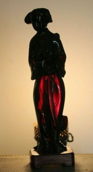 Antique c.  1920 ' s Chinese Carved Cherry Amber Bakelite Woman w/ Flower 778.  3 gms 3