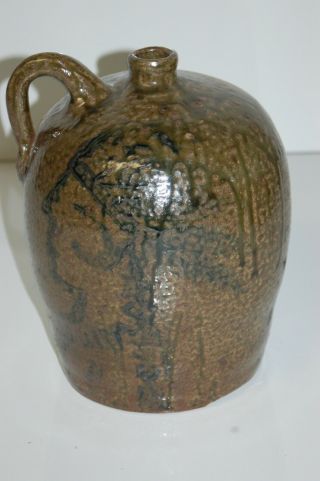 Vintage 10 3/4 " Southern Pottery Drip Glaze Indian Head Stoneware Jug