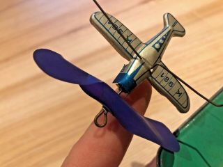 ANTIQUE US ZONE GERMANY TIN WIND UP TOY AIRPLANE GOES AROUND 1940 7