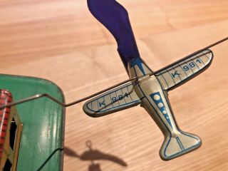 ANTIQUE US ZONE GERMANY TIN WIND UP TOY AIRPLANE GOES AROUND 1940 8