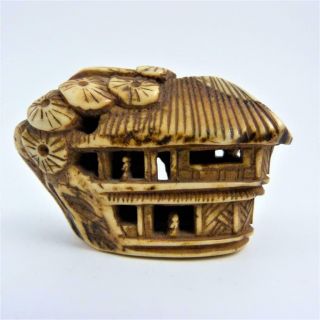 Japanese Carved Sika Deer Horn Netsuke In The Form Of A Pavillion,  Meiji Period