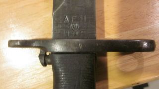 WW 2 US ARMY BAYONET it is stamped A F H US with flaming ball 7