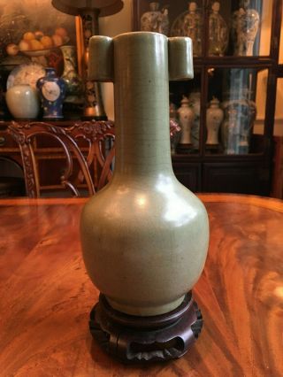 A Chinese Qing Dynasty Celadon Porcelain Vase. 12