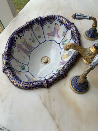 Sherle Wagner sinks With Matching Faucets And Marble Slab 7