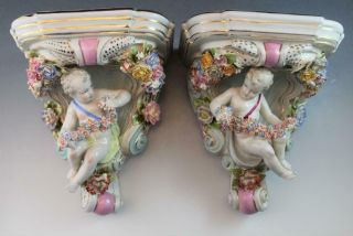 Antique Pair German Dresden Porcelain Cherubic Floral Encrusted Wall Shelves