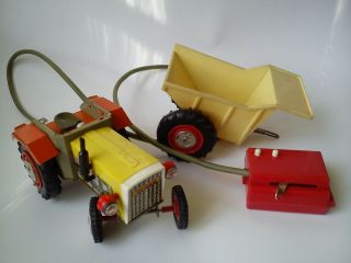 Vintage tin and plastic toy Tractor Titan with trailer made in Poland 10