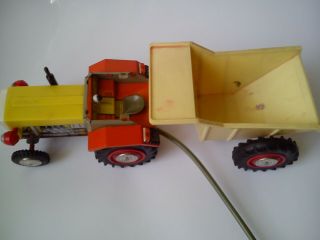 Vintage tin and plastic toy Tractor Titan with trailer made in Poland 11