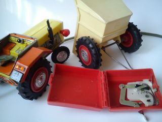 Vintage tin and plastic toy Tractor Titan with trailer made in Poland 7