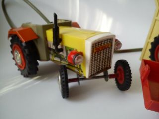 Vintage tin and plastic toy Tractor Titan with trailer made in Poland 8