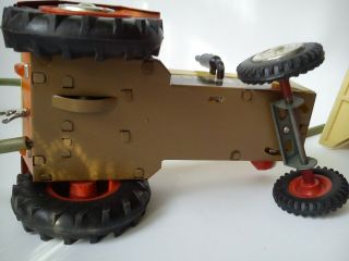 Vintage tin and plastic toy Tractor Titan with trailer made in Poland 9