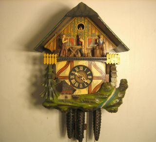 Vintage.  E.  Schmeckenbecher Cuckoo Clock Man Sawing Chopping Wood Water Wheel