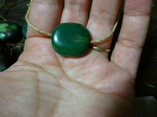 An Antique Dark Green Antique Tibetan Turquoise Bead