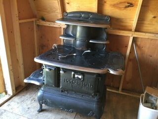 This - Cast Iron,  Wood Burning Cook Stove,  Black.