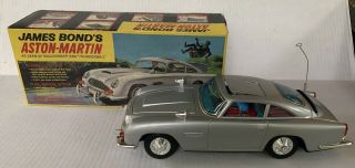 Vtg 1960s Gilbert James Bond Aston Martin Tin Battery Operated Car W/ Box