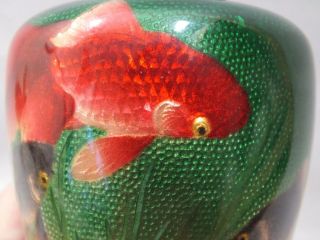 (A) A FINE JAPANESE CLOISONNE VASE WITH FISH ON A GREEN GROUND 2