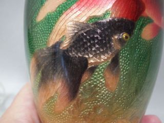 (A) A FINE JAPANESE CLOISONNE VASE WITH FISH ON A GREEN GROUND 3