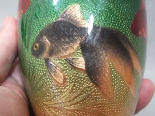 (A) A FINE JAPANESE CLOISONNE VASE WITH FISH ON A GREEN GROUND 6