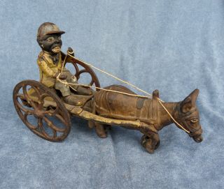Antique Cast Iron Toy Of Black Man Driving Mule Cart
