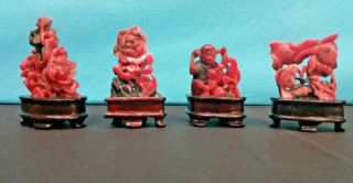 Group Of Four Chinese Rhodochrosite Carving With Wood Stand