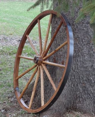 Very Rustic 24 " Large Wagon Wheels.  Quality Hardwood.  2 " Wide Rim.  Impressive.
