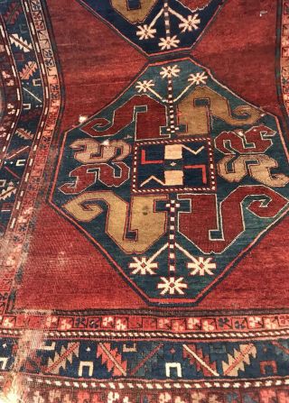 AN ANTIQUE CAUCASIAN KAZAK RUG 3