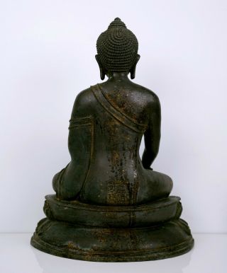 A Large Bronze Figure of Seated Shakyamuni 8