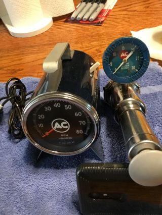 Old A/c Portible Tach A/c Spark Plug Division And A/c Radiator Pressure Tester