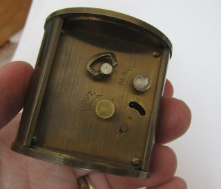 Brass Le Coultre cylindrical Swiss travel alarm clock,  not,  4 repair? 4