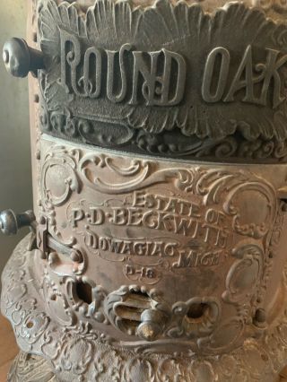 Round Oak Cast Iron Wood Stove By P.  D.  Beckwith Door Model D18