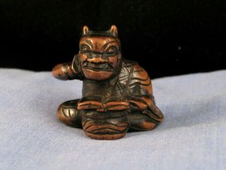 Meiji Antique Japanese Carved Wooden Netsuke Reading Book Demon God Figurine