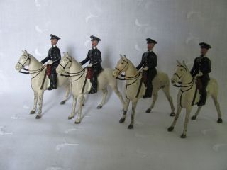 4 Vintage Lead Soldiers/police On Horseback Proprietors Britains Ltd England