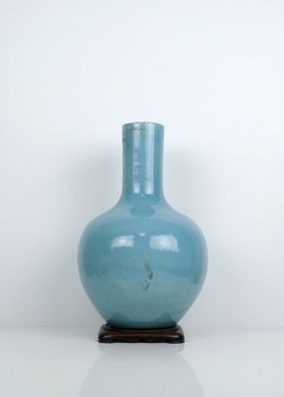 A Large Sky - Blue Glazed Crackle Vase With Wooden Stand