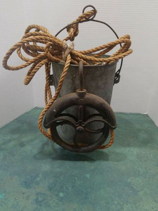 ANTIQUE RUSTIC IRON WATER WELL PULLEY,  WITH GALVANIZED WATER BUCKET/SOME HOLES 12