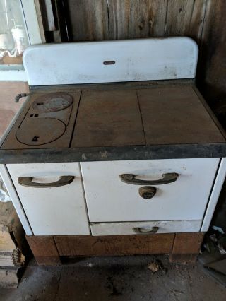 Dutch Queen wood burning cook stove; needs restoration; stored in barn. 2