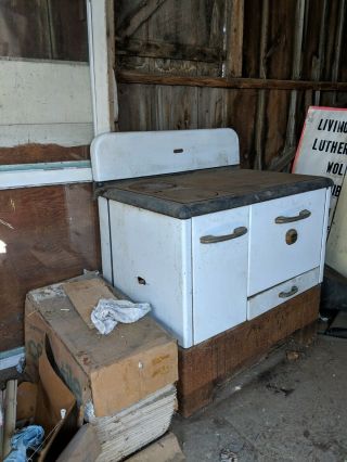 Dutch Queen wood burning cook stove; needs restoration; stored in barn. 3