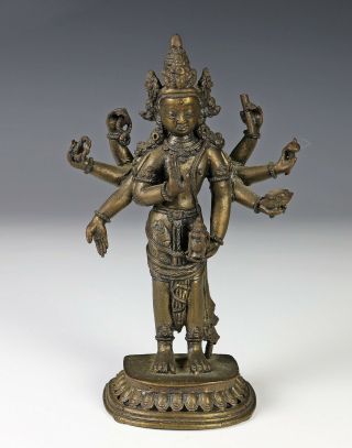 Antique Chinese Tibetan Bronze Of Eight Armed Standing Bodhisattva
