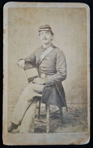 Cdv Of Seated Civil War Soldier Wearing Frock Coat,  Forage Cap And Accoutrement