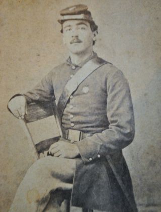CDV of Seated Civil War Soldier Wearing Frock Coat,  Forage Cap and Accoutrement 2